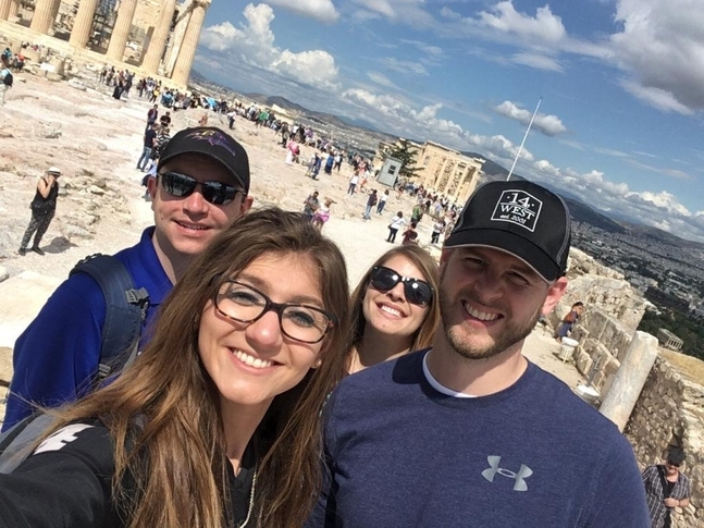 Adam Markley and his fellow Global Field Study classmates take a selfie at the Parthenon in Athens, Greece