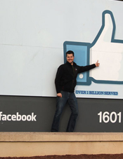 Josh Ziggas in front of Facebook's headquarters. Photo credit: Terry Breschi